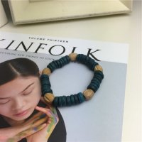 深蓝色  椰子壳	椰子壳材质特色手链 度假必备