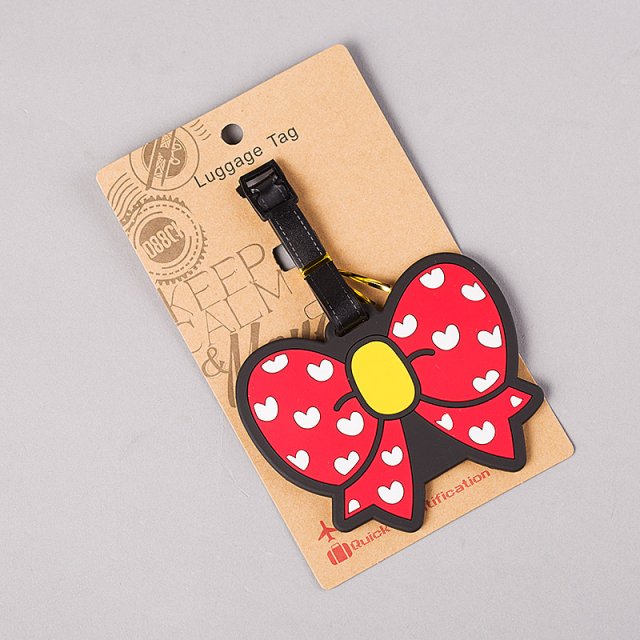 red bow tie luggage tag, luggage compartment luggage tag