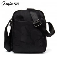 丹爵(DANJUE)新款男包 时尚迷彩布单肩包 休闲男士竖款斜挎包 D8090-1